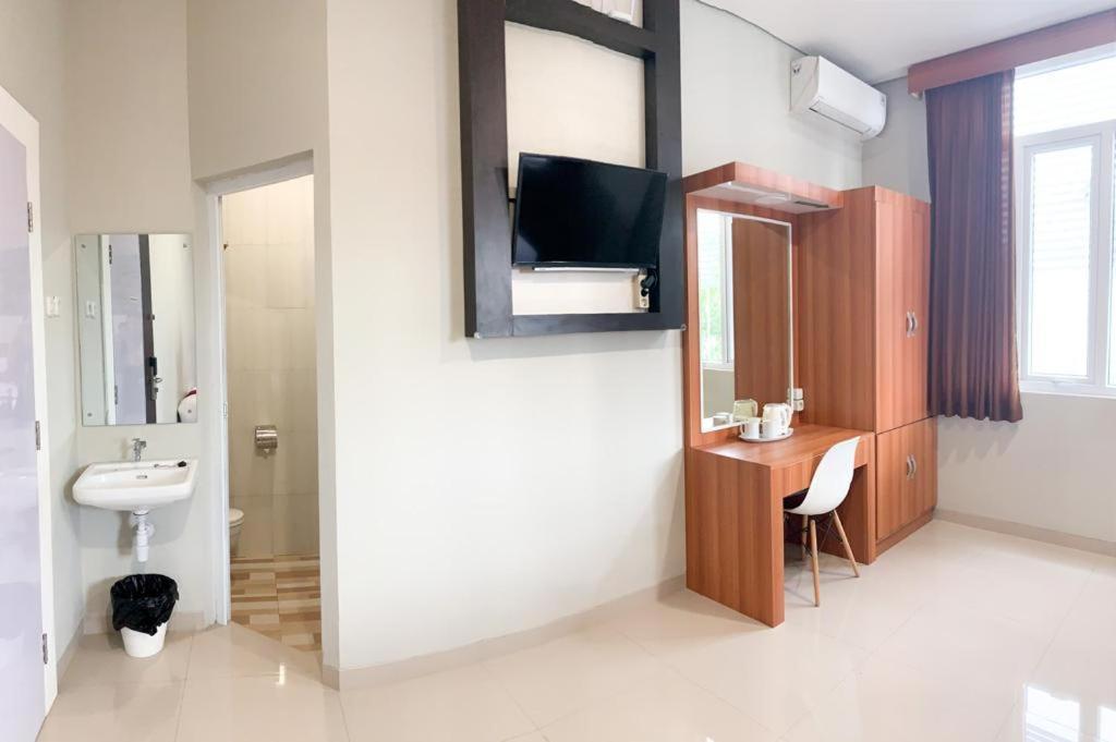 Oyo 2816 Privato Suite Kembaran Экстерьер фото